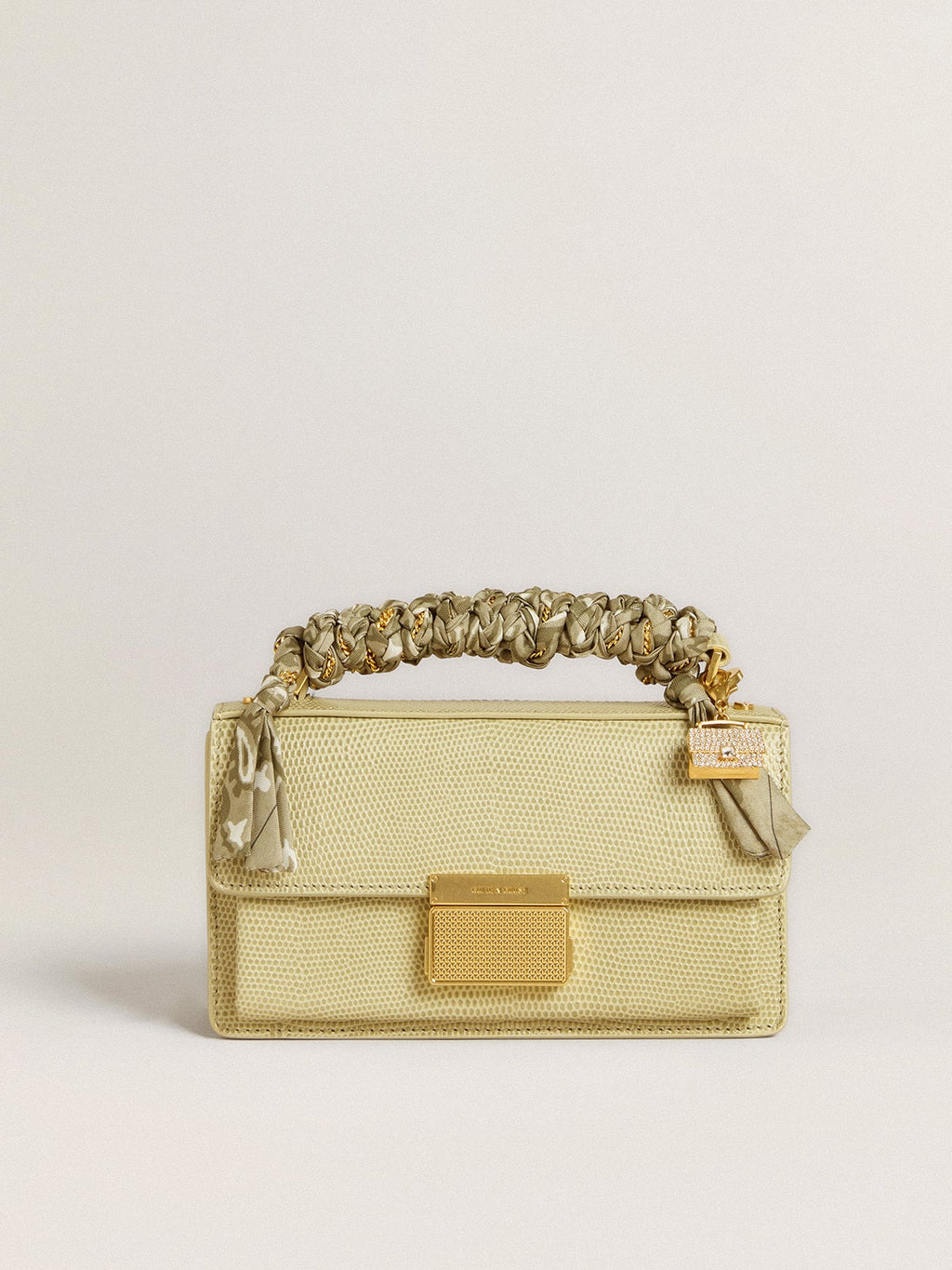 Purse-shaped charm in gold-colored brass with crystals| Golden Goose