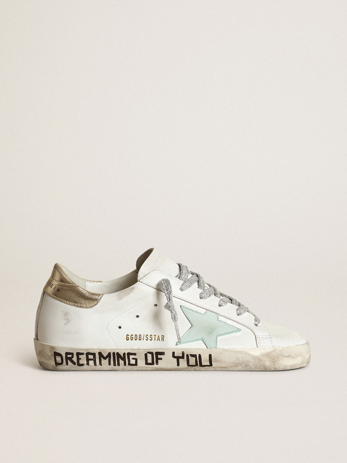 Super-Star LTD with an aquamarine star and platinum heel tab| Golden Goose