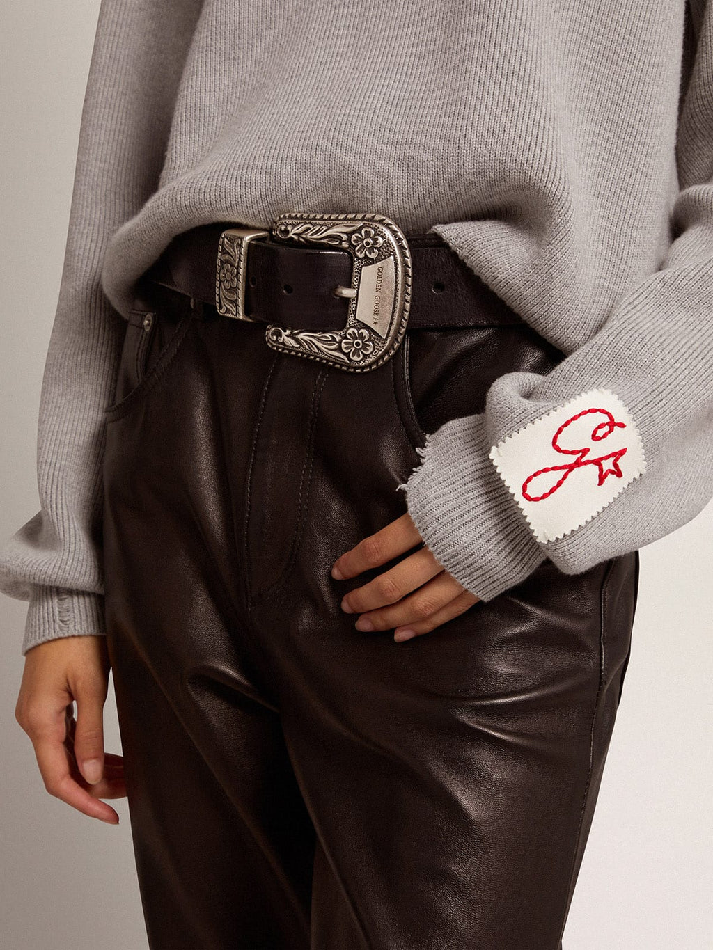 Women's belt in black leather with silver decorated buckle| Golden Goose