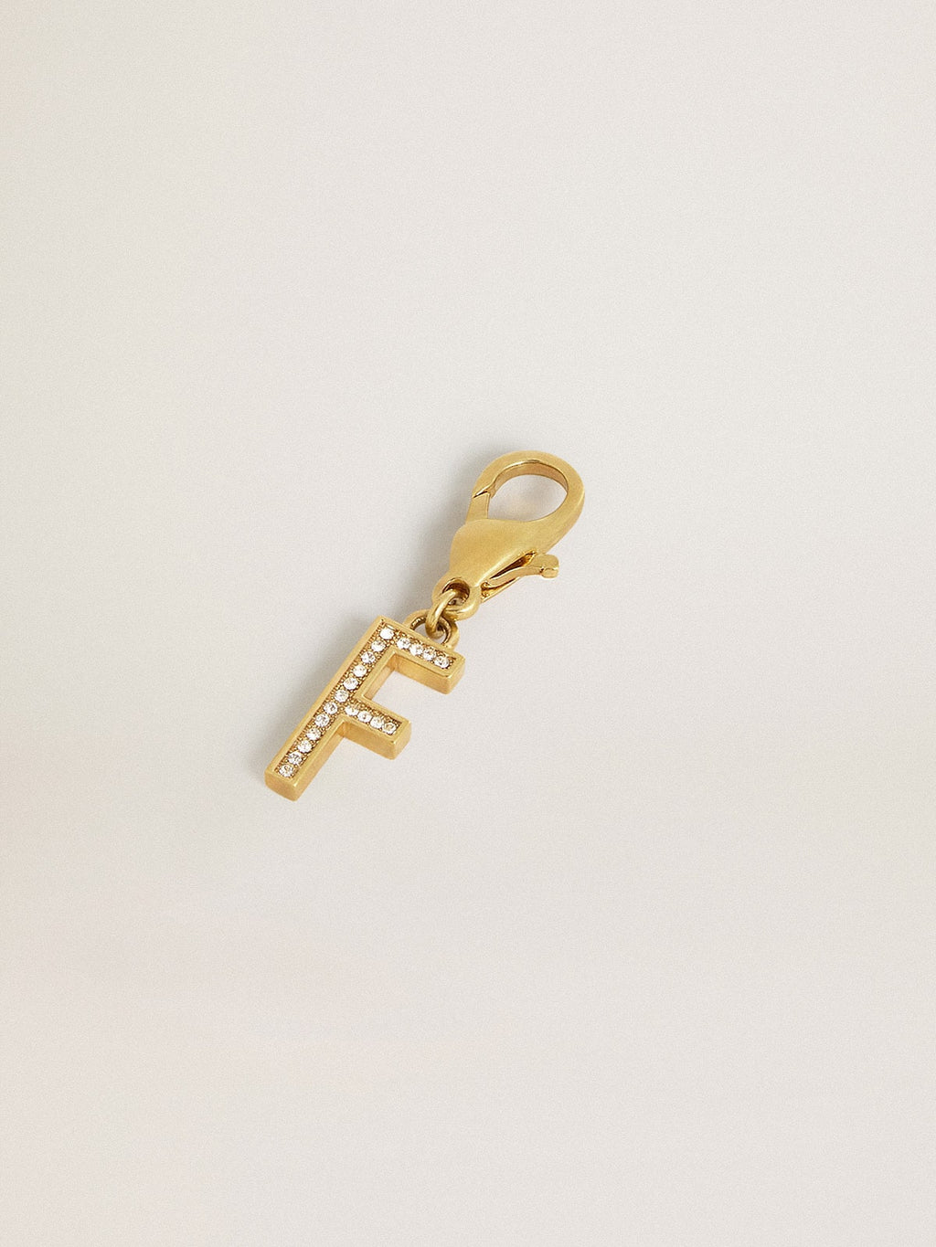 Letter F charm in gold-colored brass with crystals| Golden Goose