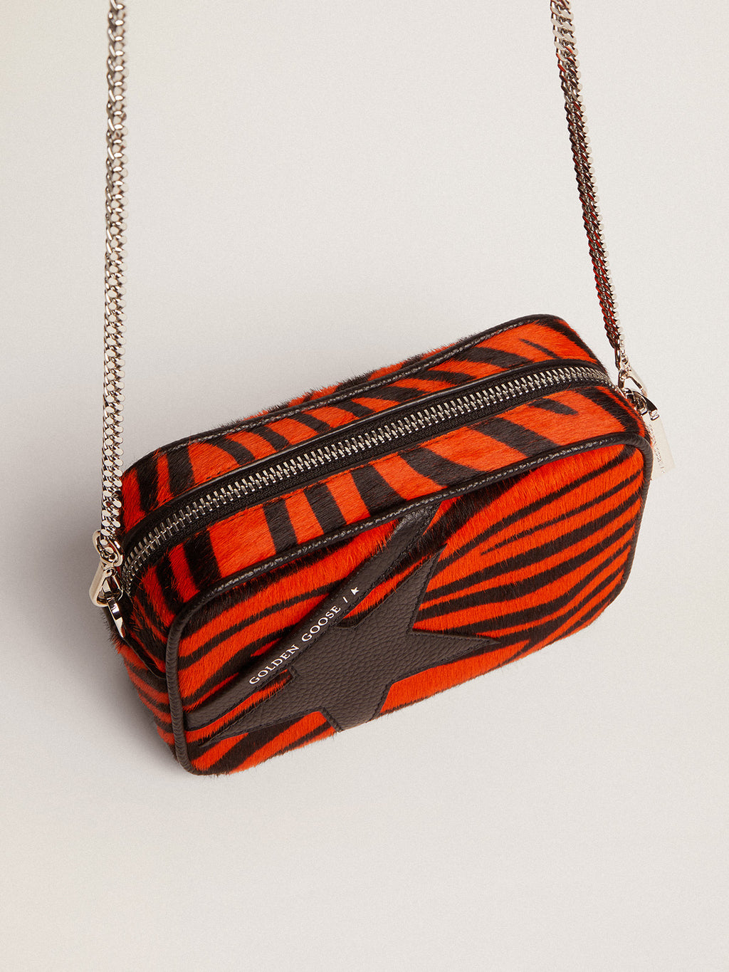Women's Mini Star Bag in orange tiger print pony skin with black star| Golden Goose