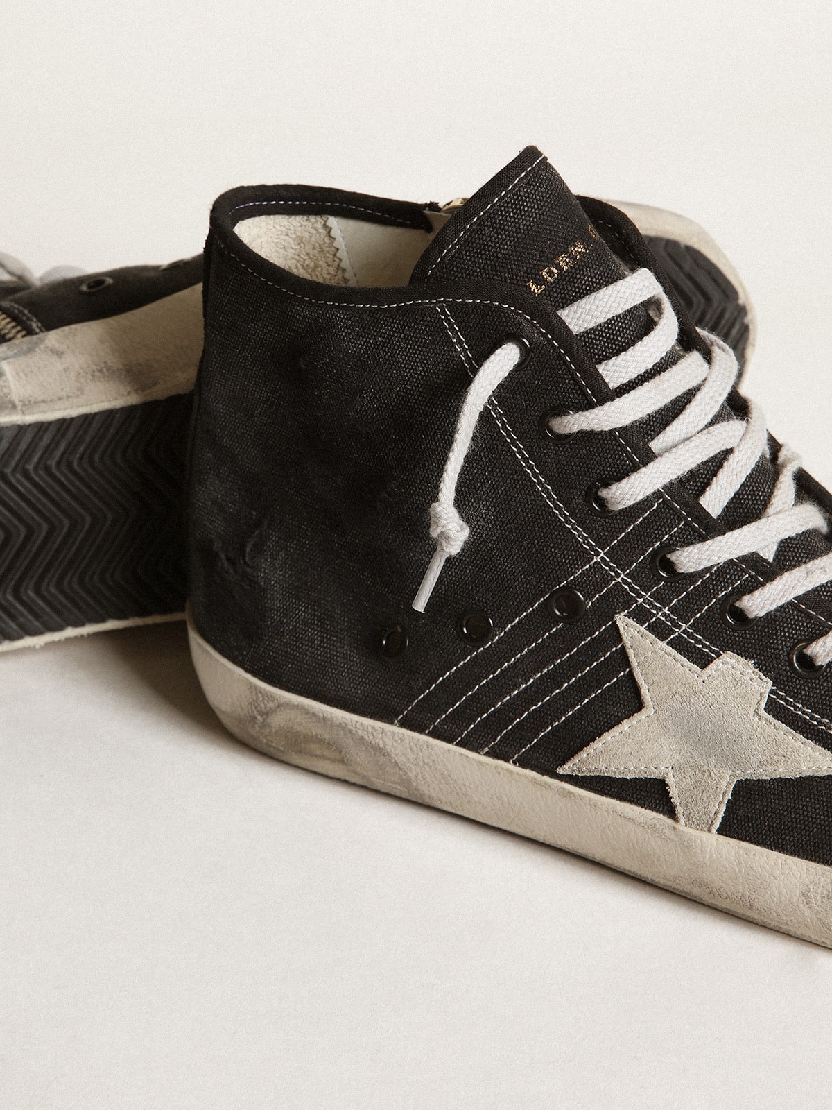 Francy Penstar in black canvas with white suede star and black suede heel tab| Golden Goose