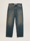 Blue jeans with a lived-in treatment| Golden Goose