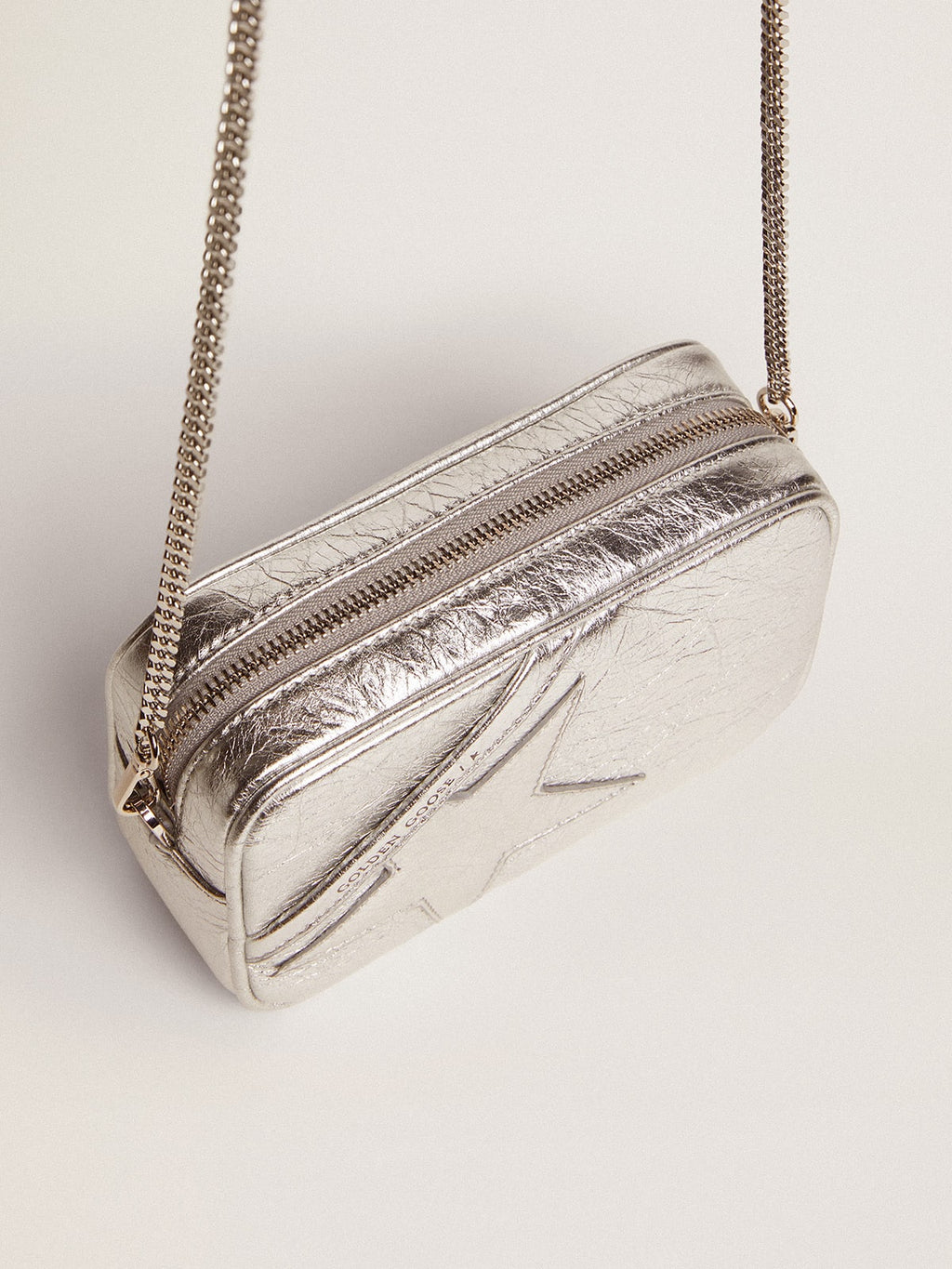 Women's Mini Star Bag in silver laminated leather with tone-on-tone star| Golden Goose