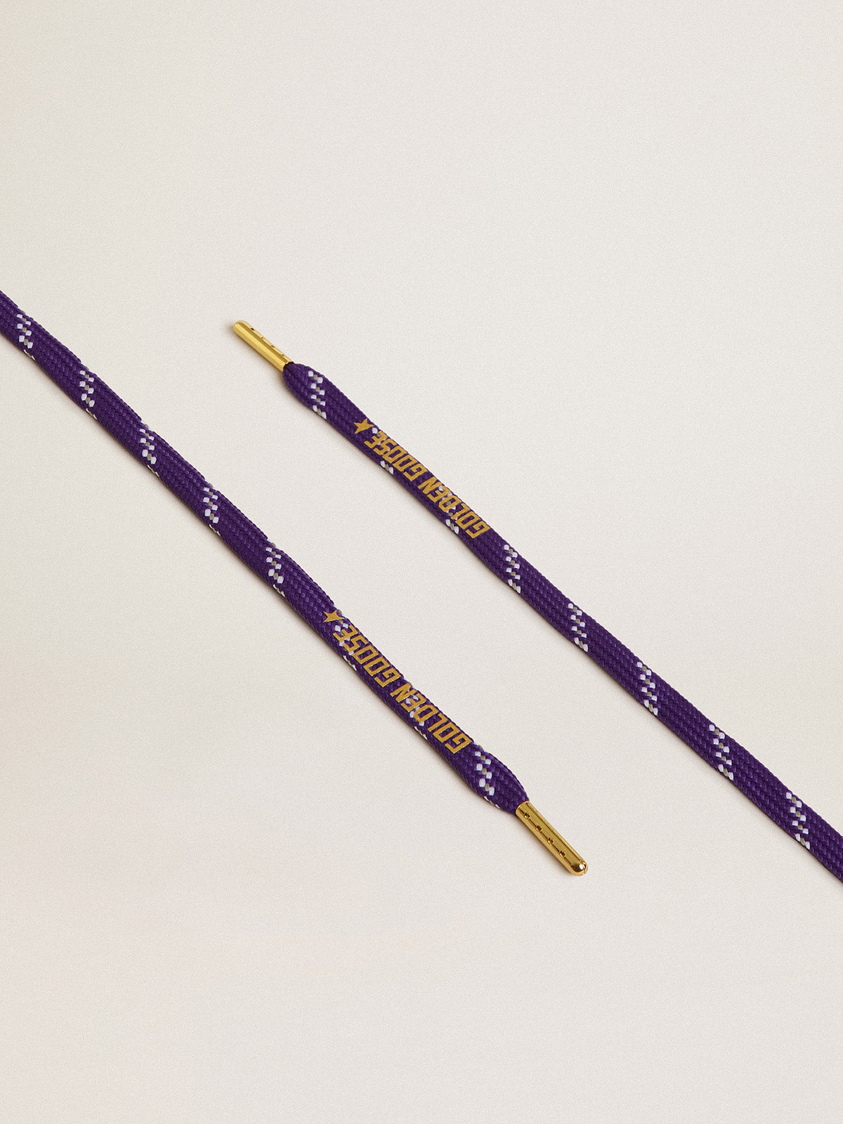 Purple laces with decorations and contrasting gold-colored logo| Golden Goose