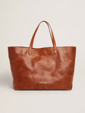 Pasadena Bag in tan-colored glossy hammered leather with gold logo on the front| Golden Goose