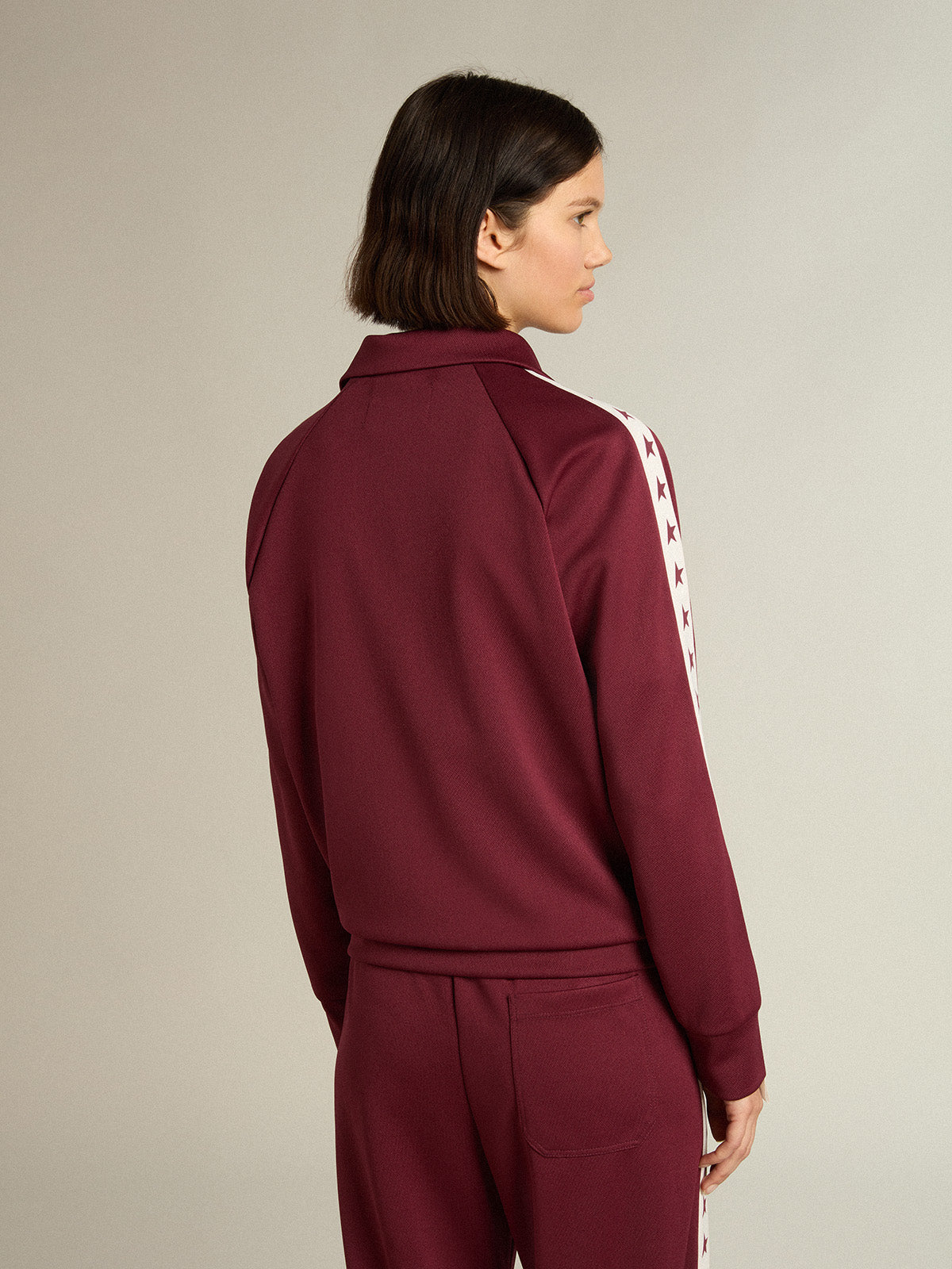 Women's burgundy zipped sweatshirt with white strip and contrasting stars| Golden Goose