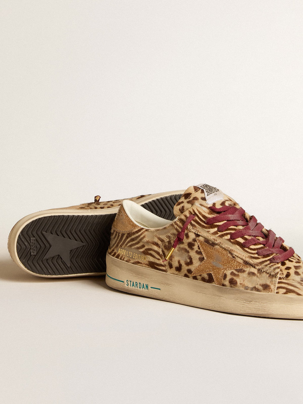 Men's Stardan LTD in animal-print pony skin with gold glitter star| Golden Goose