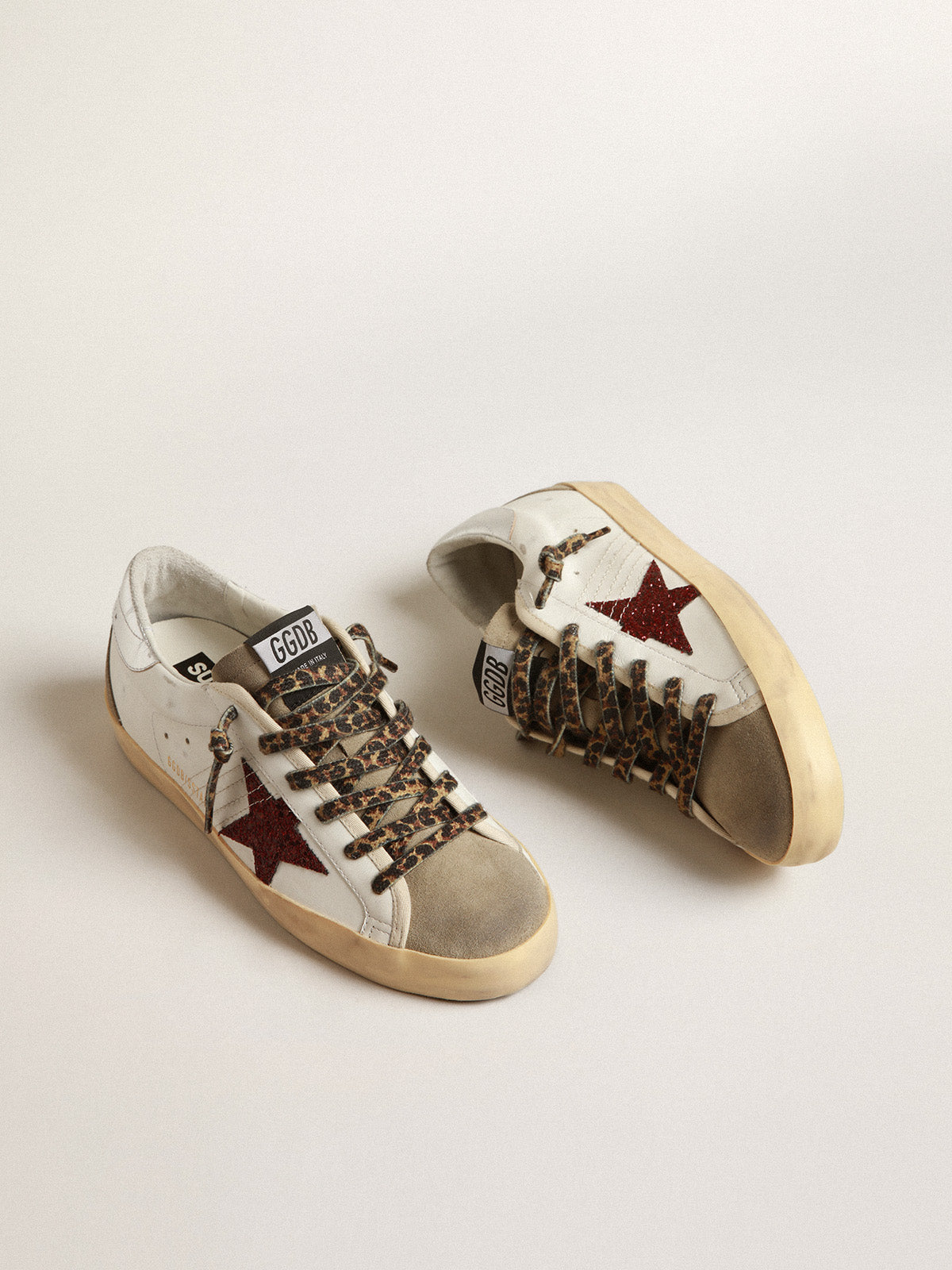 Super-Star with burgundy glitter star and silver heel tab| Golden Goose