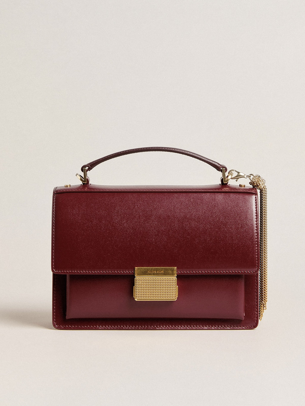 Venezia Bag in burgundy boarded leather with gold details| Golden Goose
