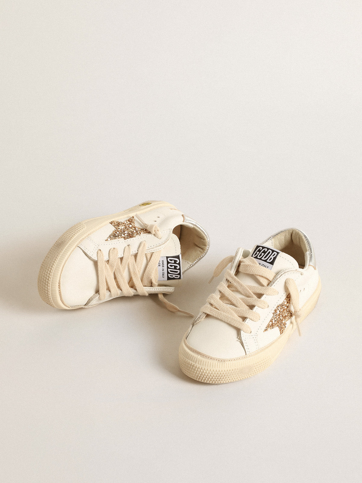 May Young with gold glitter star and metallic leather heel tab| Golden Goose