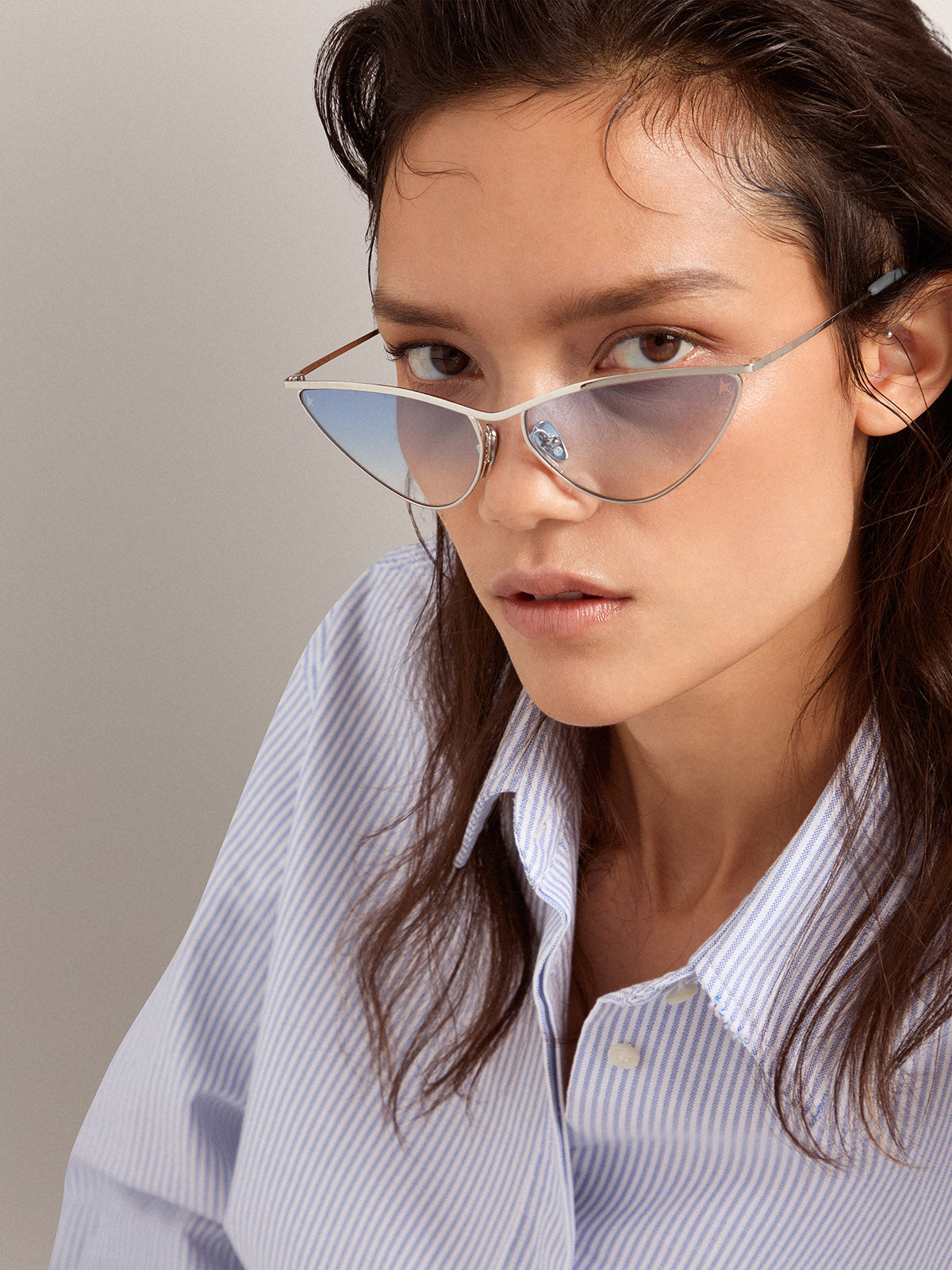 Sunglasses cat-eye style with silver frame and blue lenses| Golden Goose