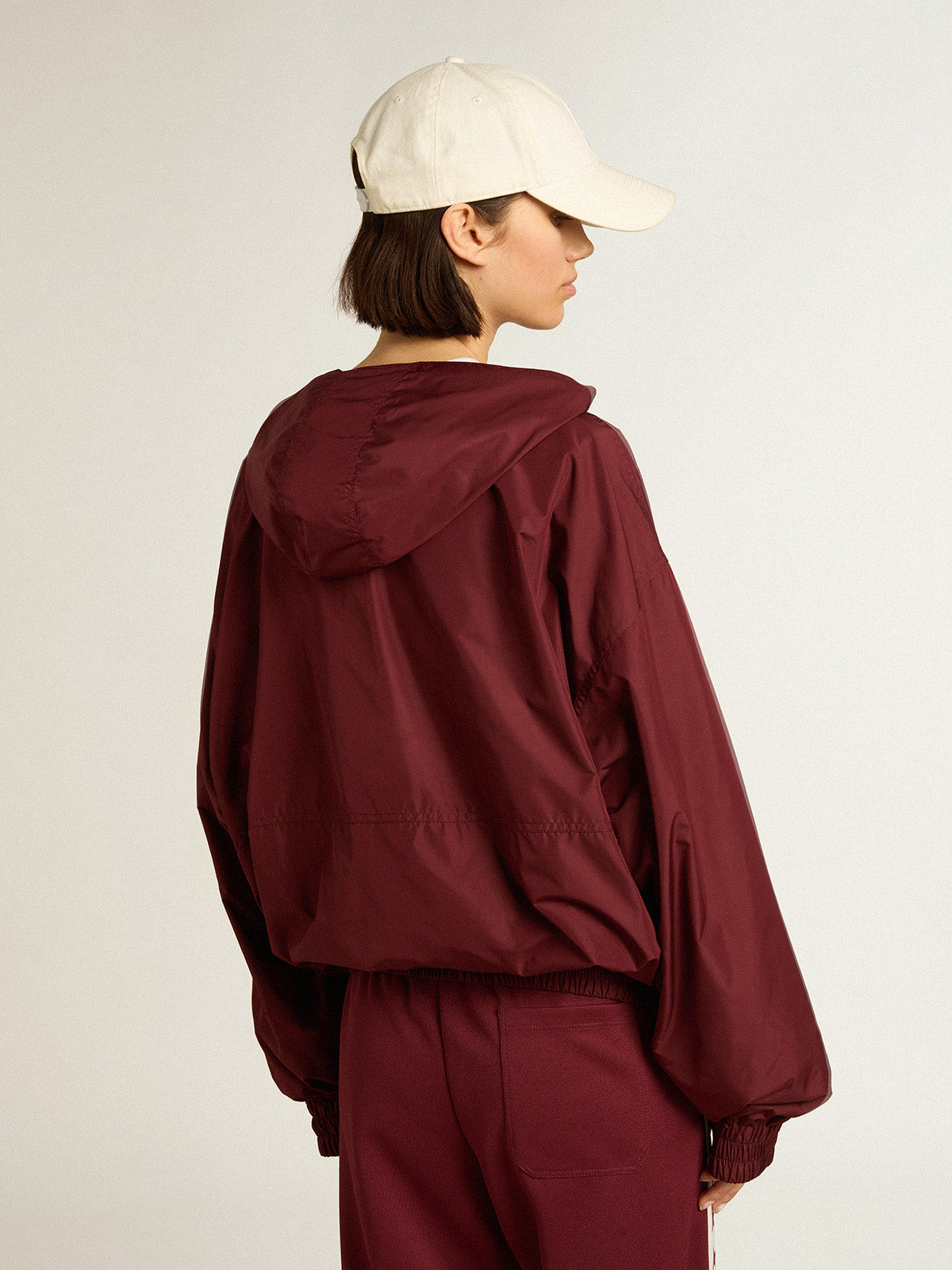 Burgundy windbreaker with hood| Golden Goose