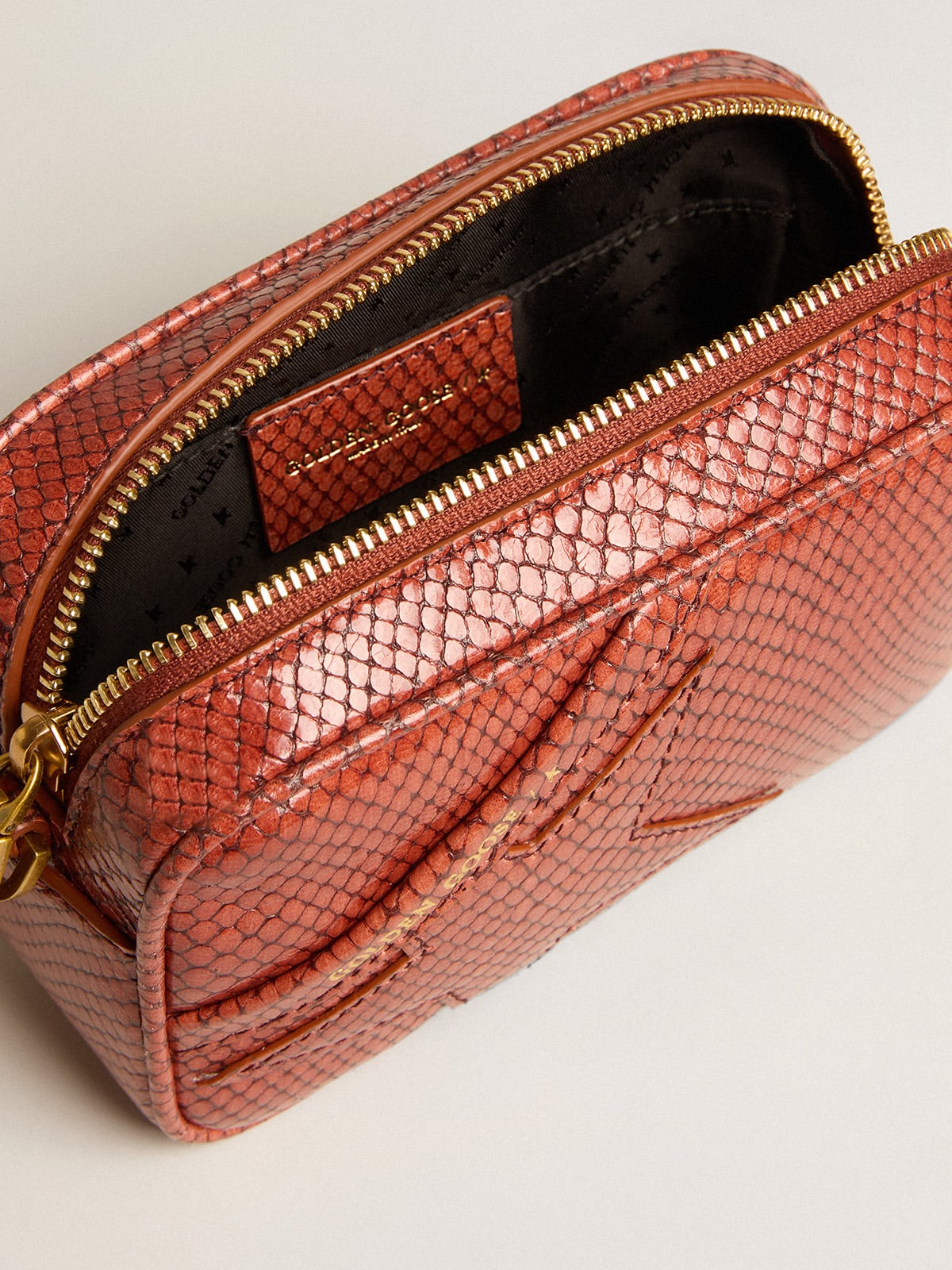 Mini Star Bag in rust-colored snake-print leather| Golden Goose