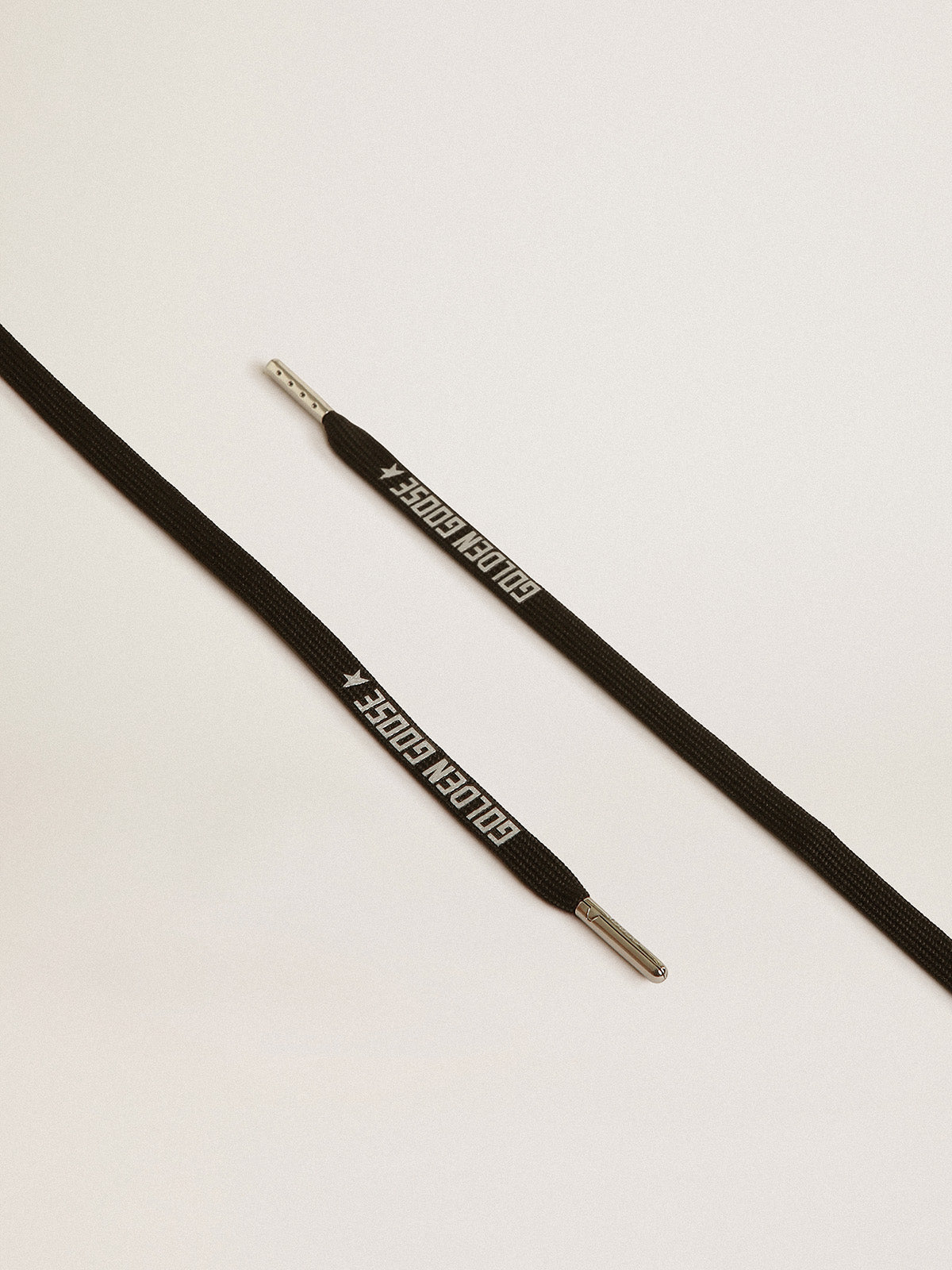 Black cotton laces with contrasting silver-colored logo| Golden Goose