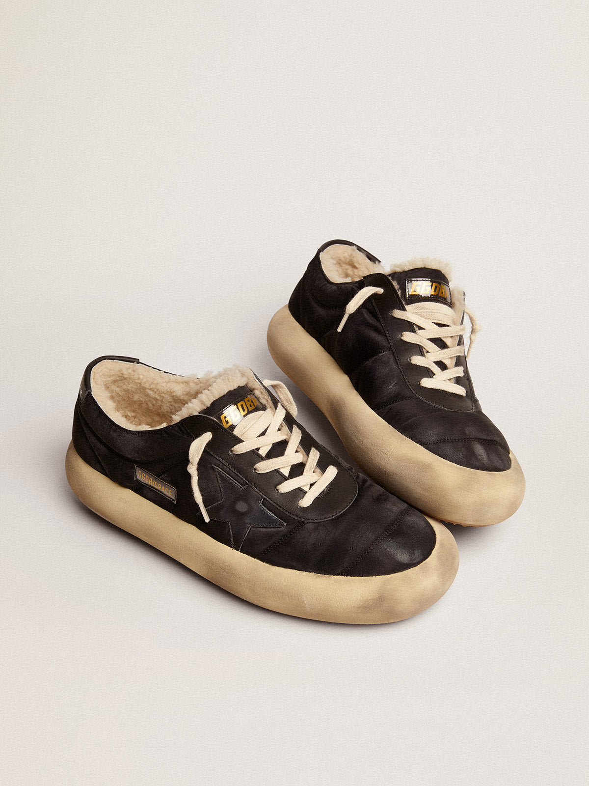 Women's Space-Star shoes in quilted black nylon with shearling lining| Golden Goose