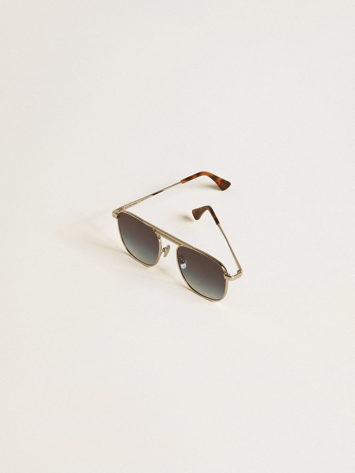 Aviator style sunglasses with silver frame and blue lenses| Golden Goose