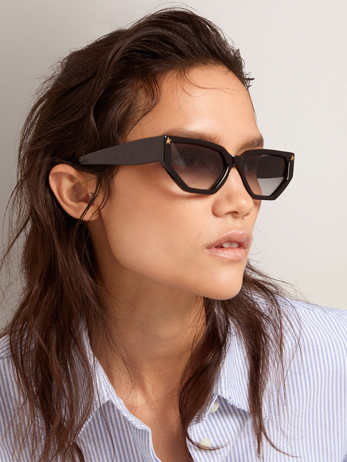 Rectangular-style Sunframe Jackie with black frame and gold details| Golden Goose