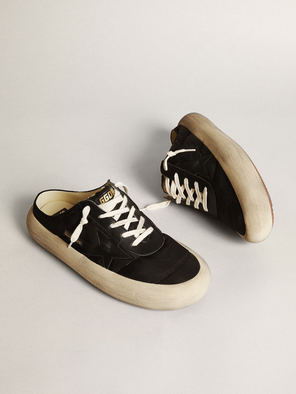 Men's Space-Star Sabots in black nylon with black leather star| Golden Goose