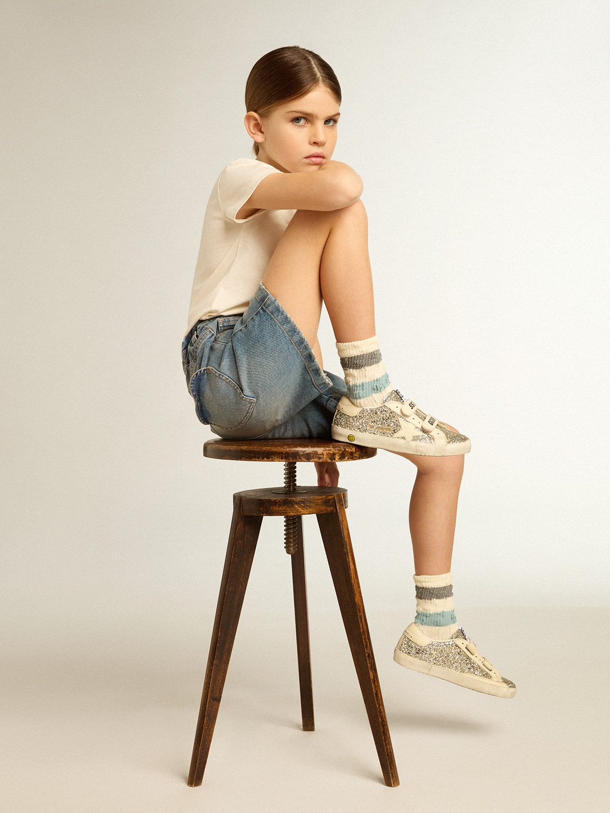 Old School Young in platinum glitter with leather star and heel tab| Golden Goose