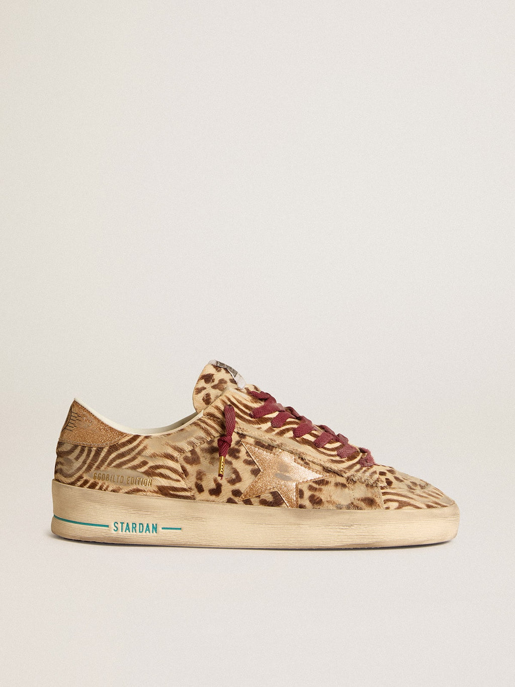 Men's Stardan LTD in animal-print pony skin with gold glitter star| Golden Goose