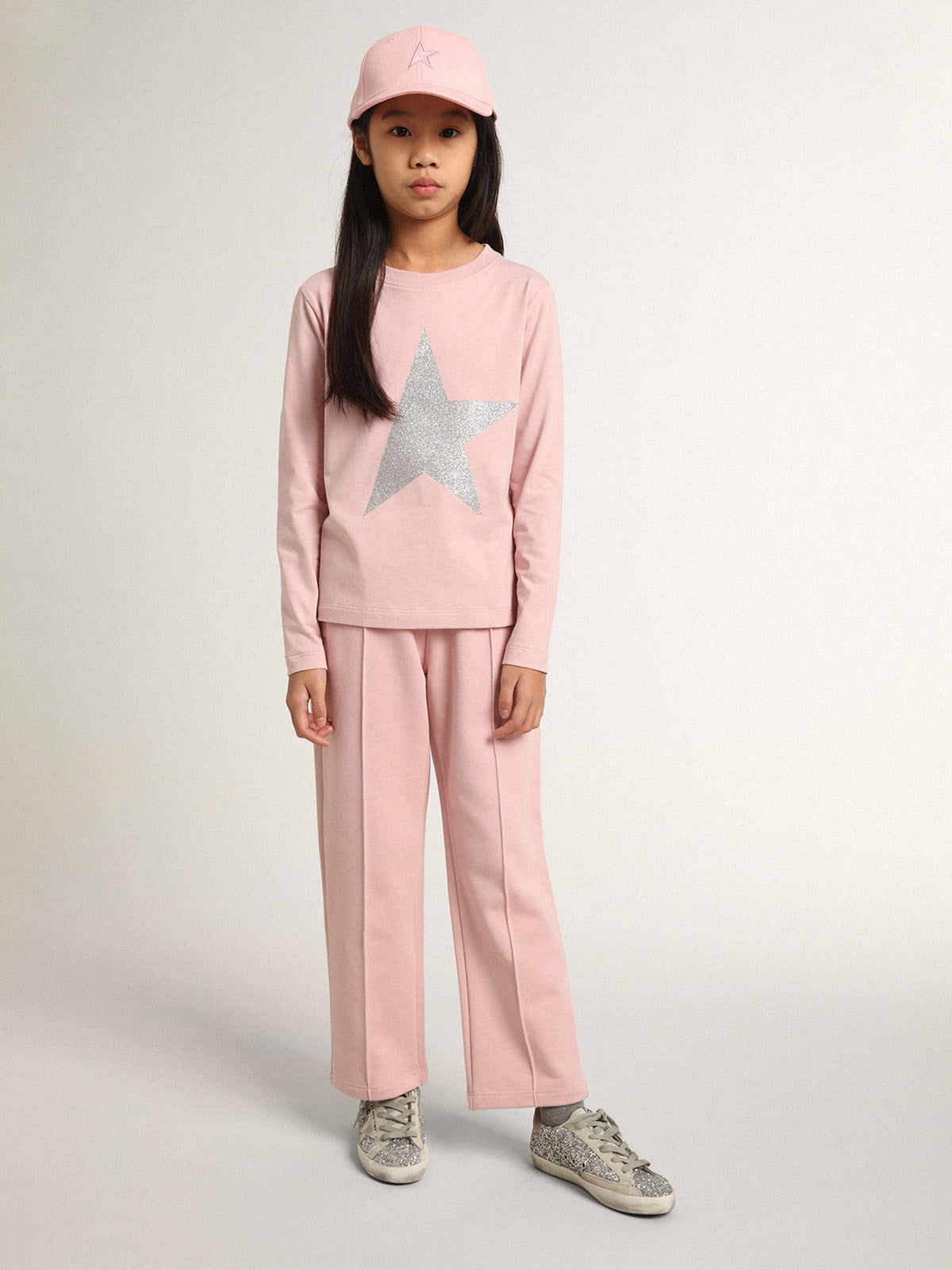Pink joggers with glitter star on the front| Golden Goose