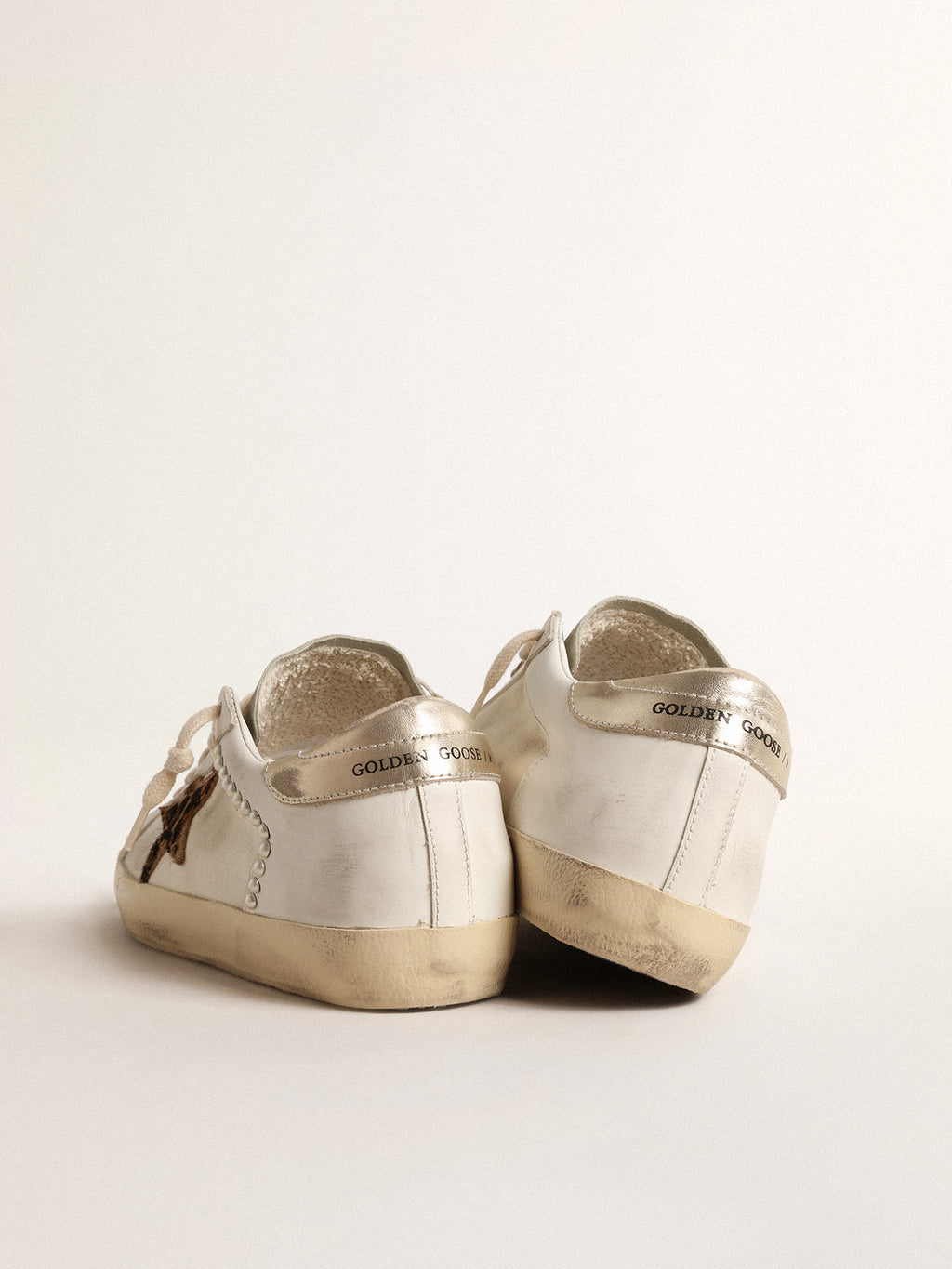 Super-Star LTD in canvas and leather with leopard-print pony skin star| Golden Goose