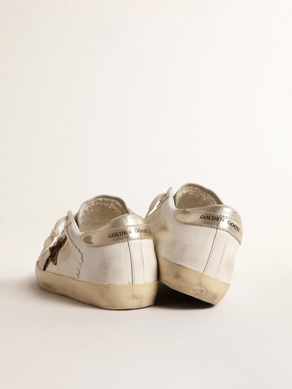 Super-Star LTD in canvas and leather with leopard-print pony skin star| Golden Goose