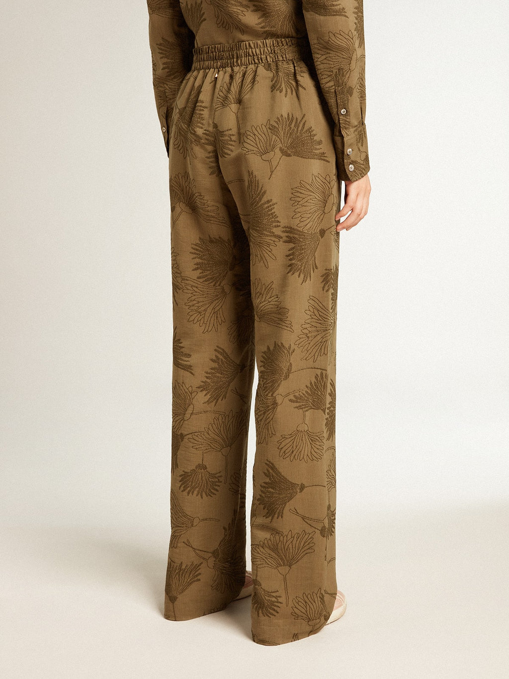 Women's olive-colored viscose-cotton blend pants with floral pattern