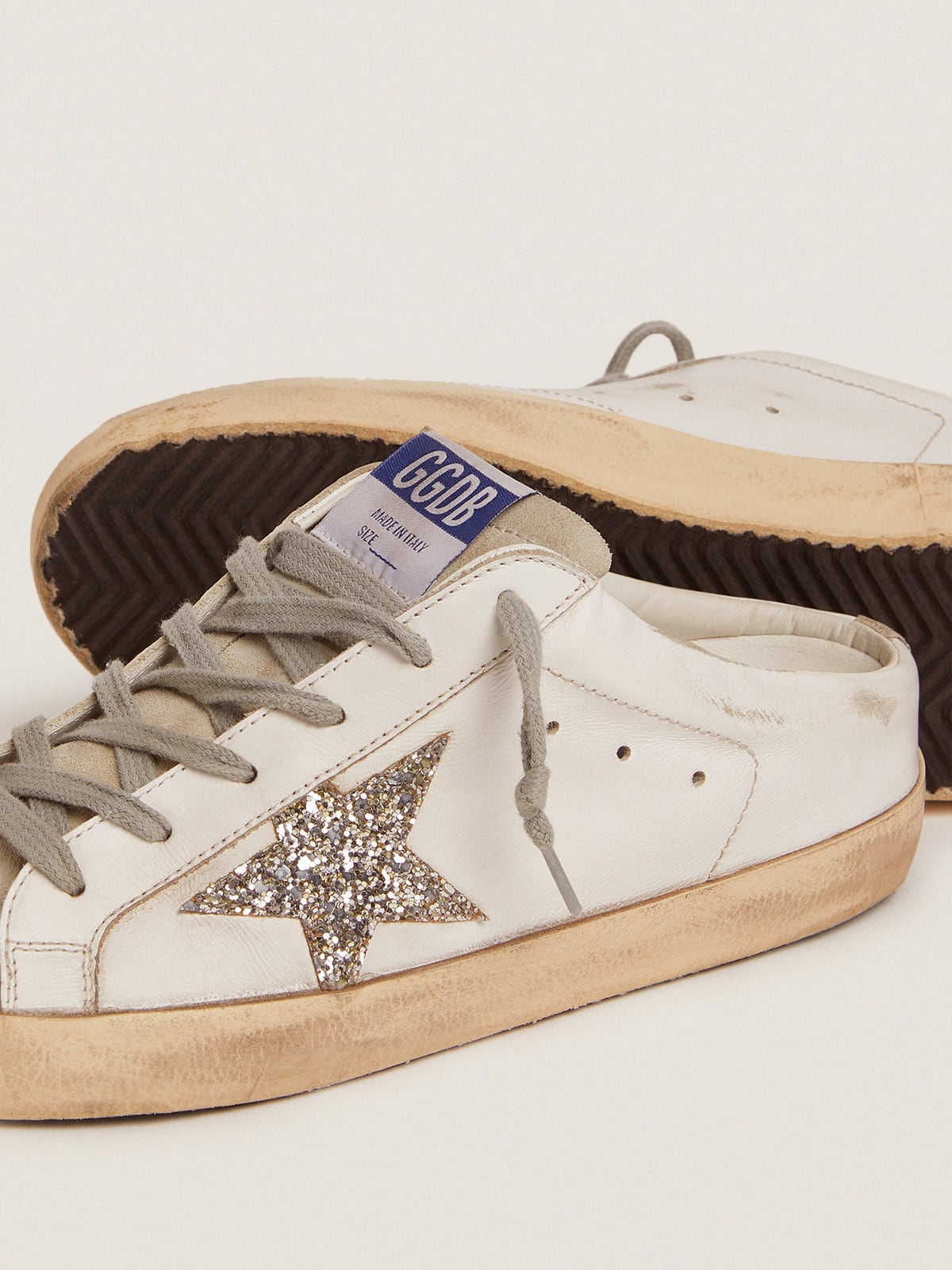Super-Star Sabot with a platinum glitter star and suede tongue| Golden Goose
