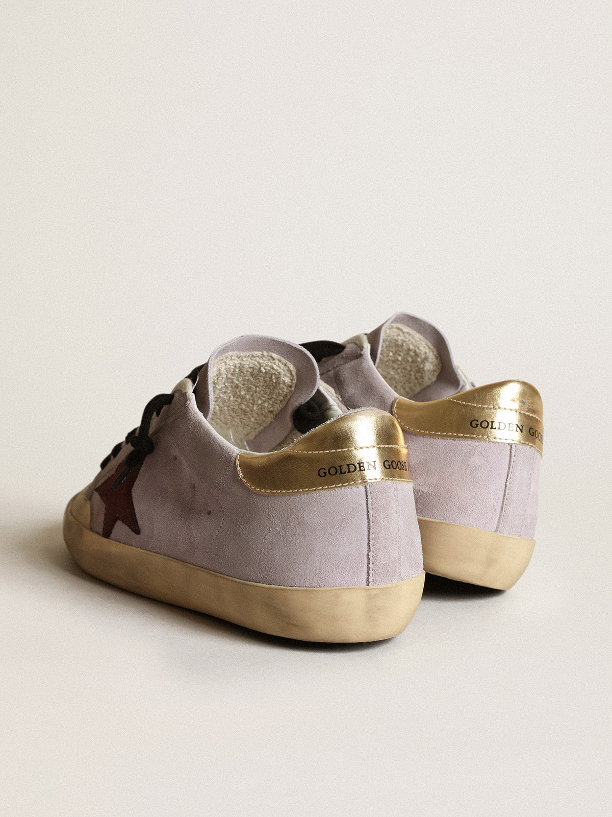 Super-Star in lilac suede with a brown star and gold heel tab| Golden Goose