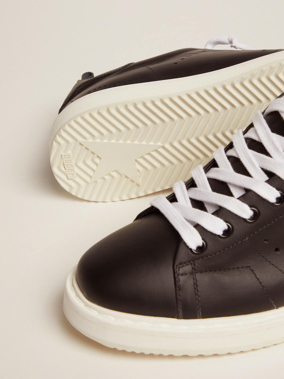 Starter sneakers in total black leather| Golden Goose