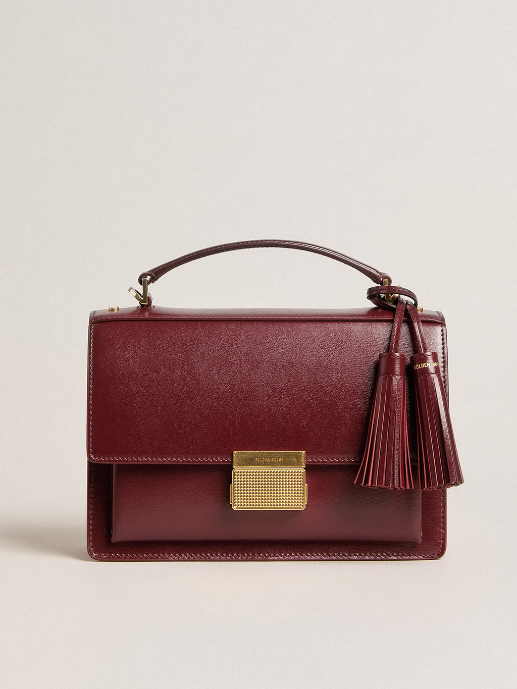 Venezia Bag in burgundy boarded leather with gold details| Golden Goose