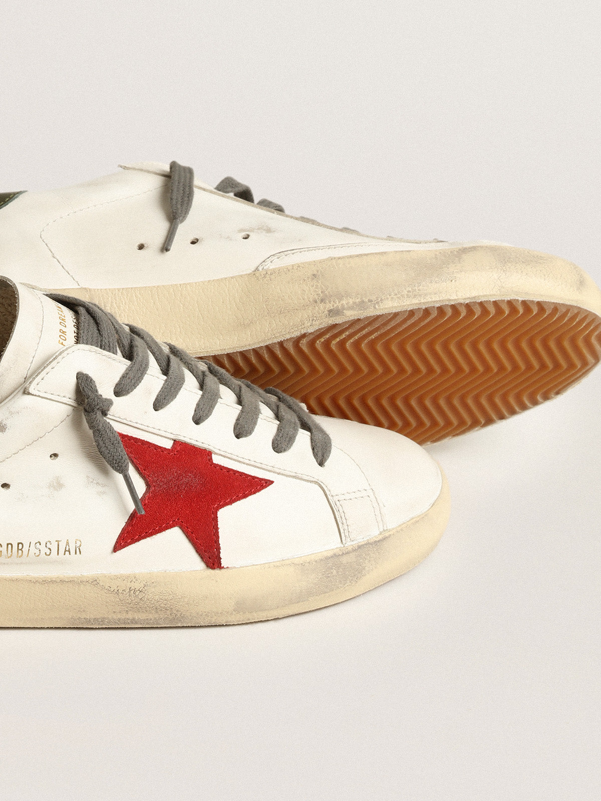 Super-Star with red suede star and green leather heel tab| Golden Goose