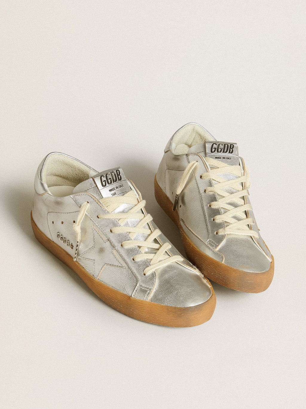 Super-Star in silver metallic leather with leather star and heel tab| Golden Goose