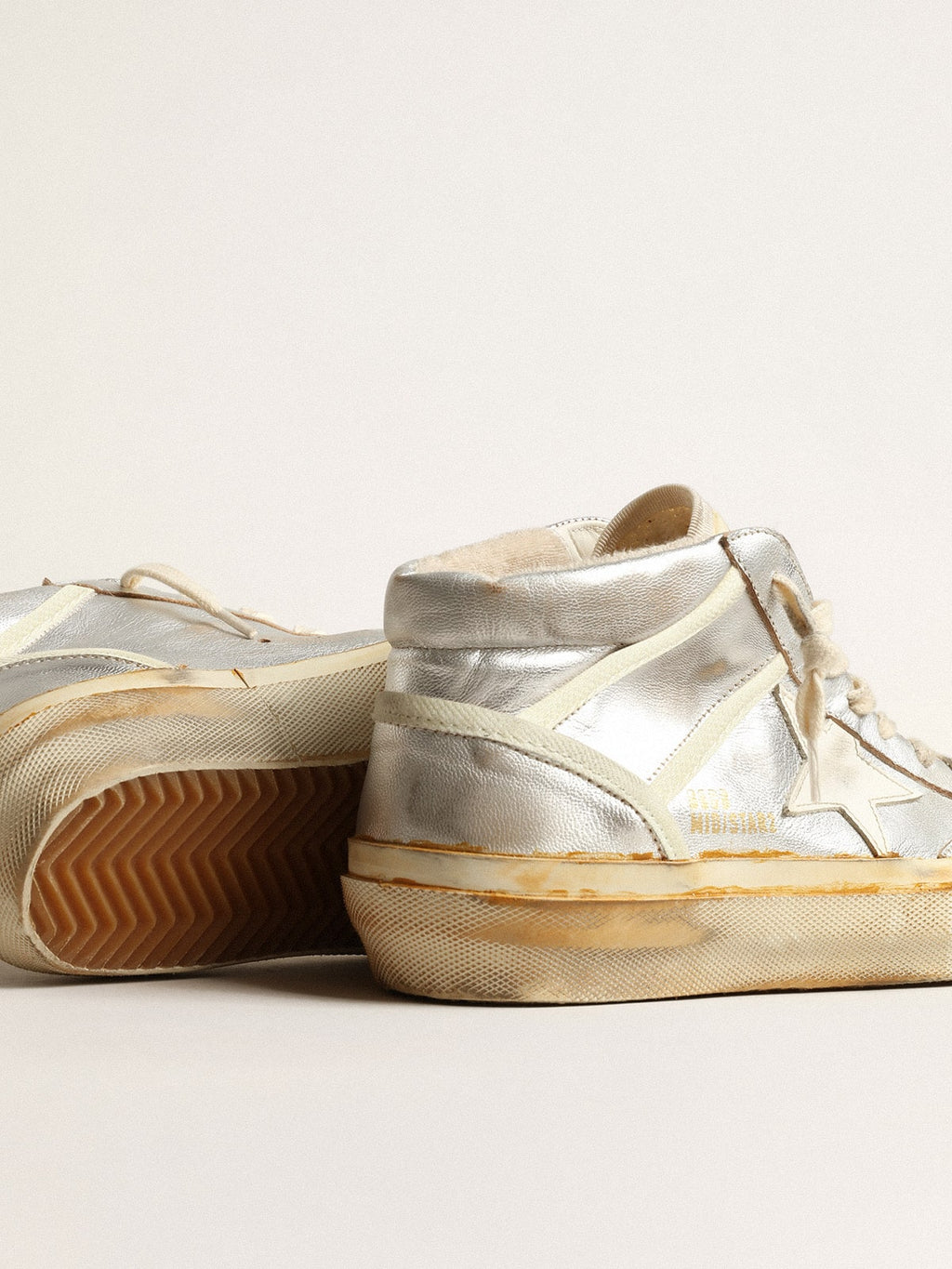 Men's Mid Star in silver metallic leather with ivory star| Golden Goose