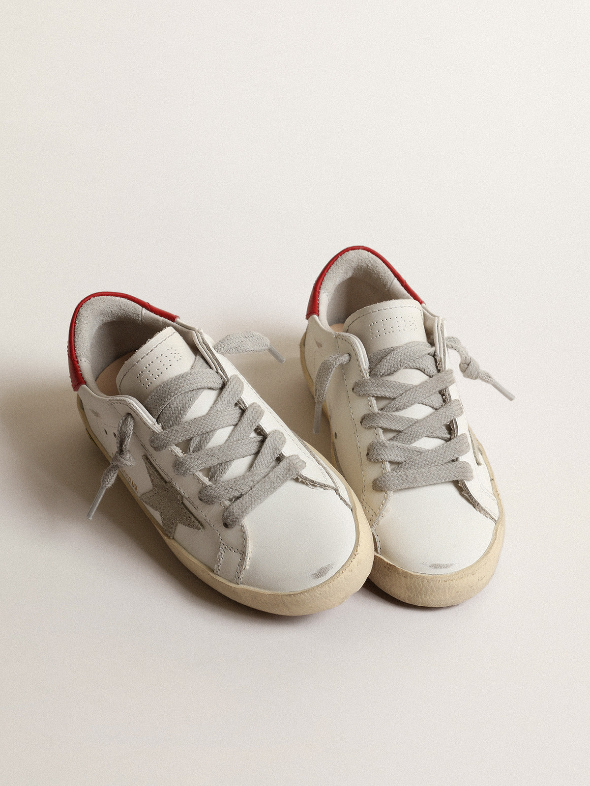 Super-Star Young with suede star and red leather heel tab| Golden Goose