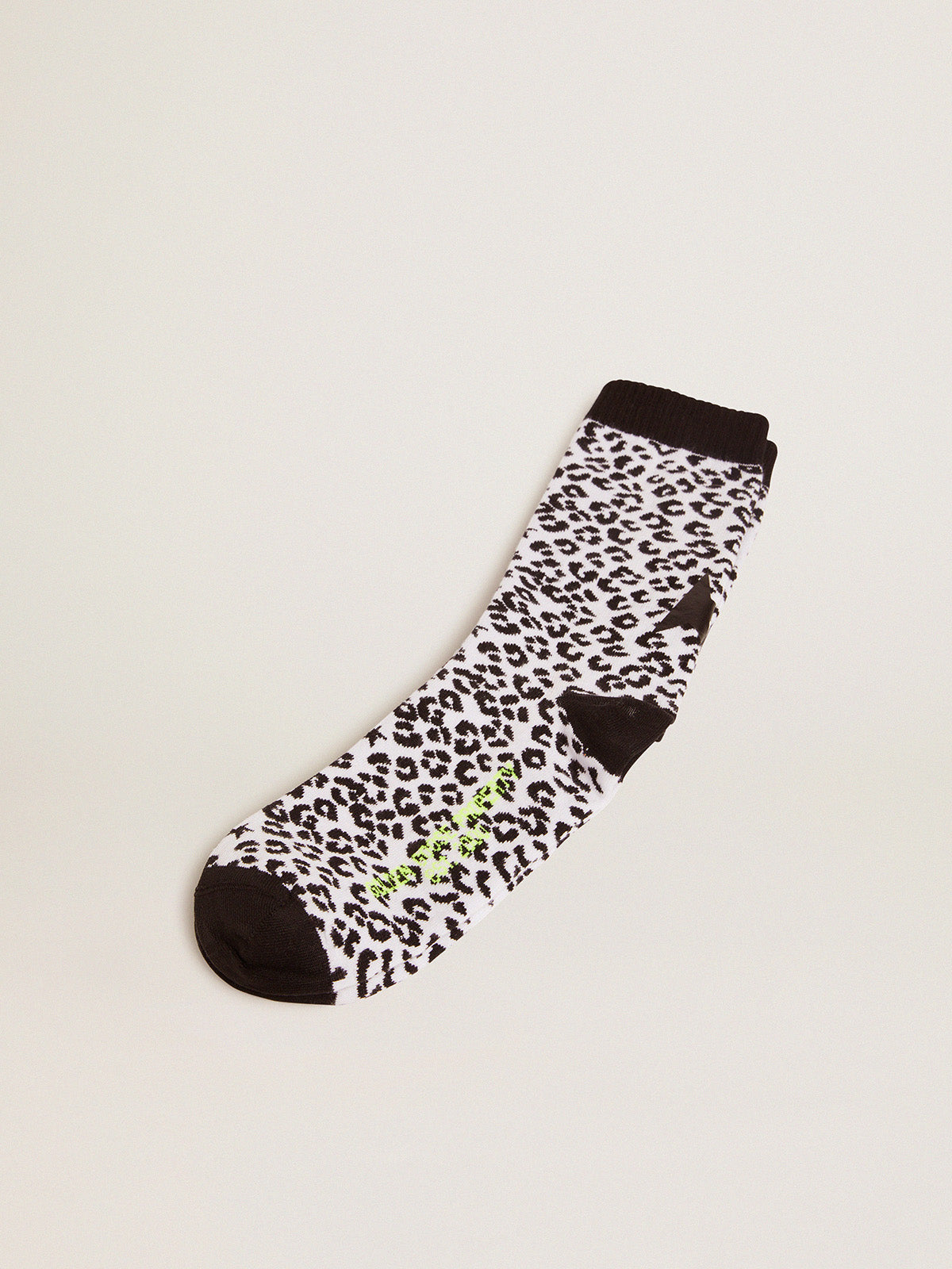 Black and white socks with leopard print and black star on the back| Golden Goose