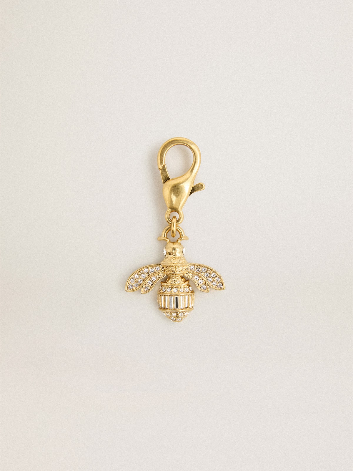 Bee-shaped charm in gold-colored brass with crystals| Golden Goose