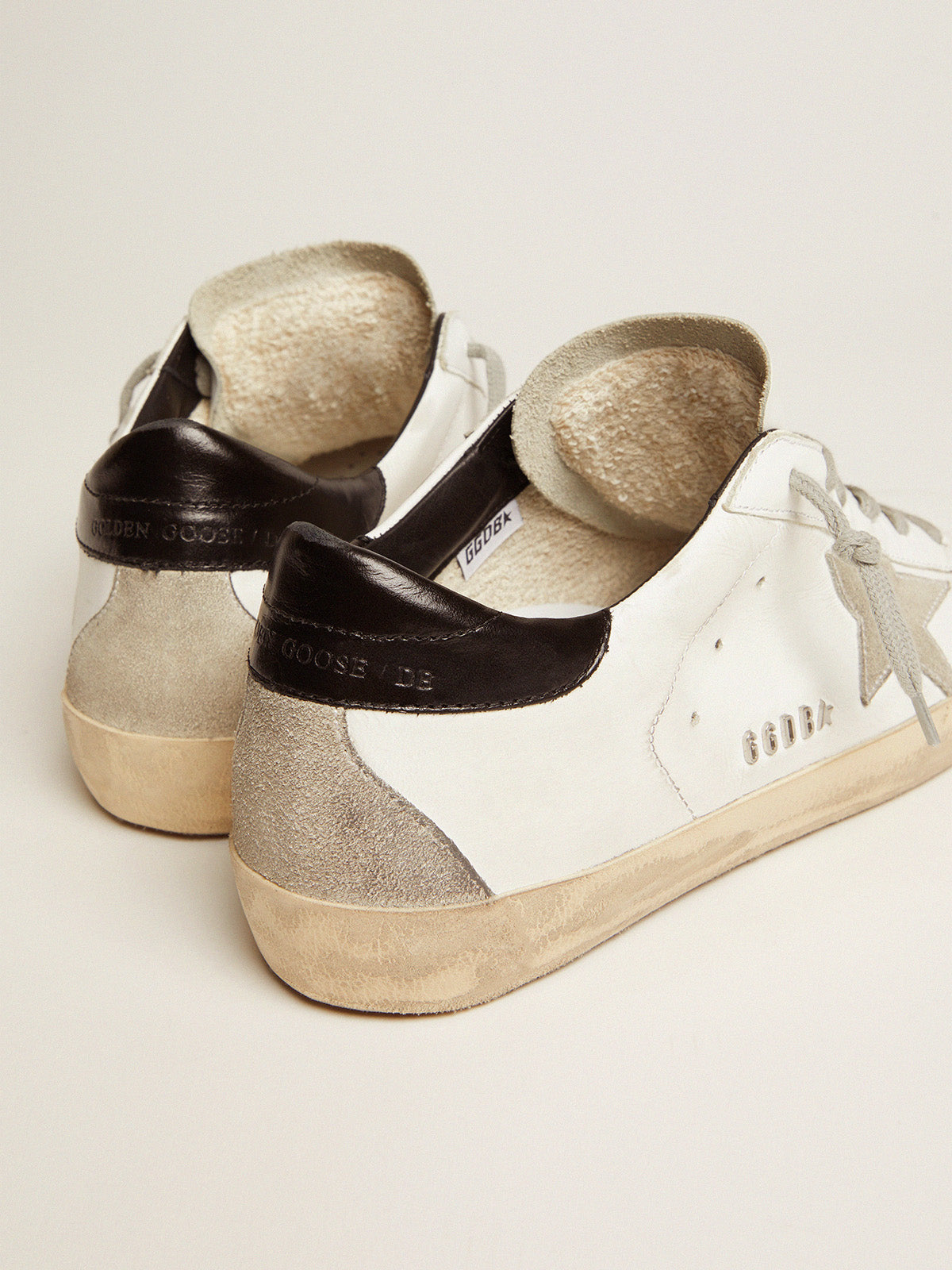 Women's Super-Star with black heel tab and metal stud lettering| Golden Goose