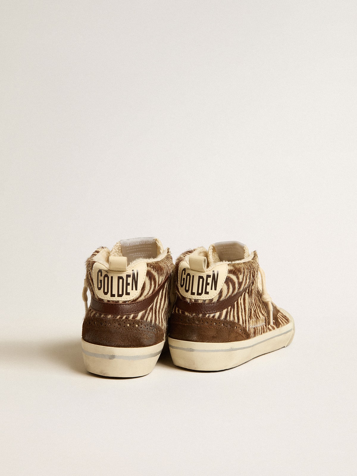 Mid Star LTD in zebra-print pony skin with suede star and brown flash| Golden Goose