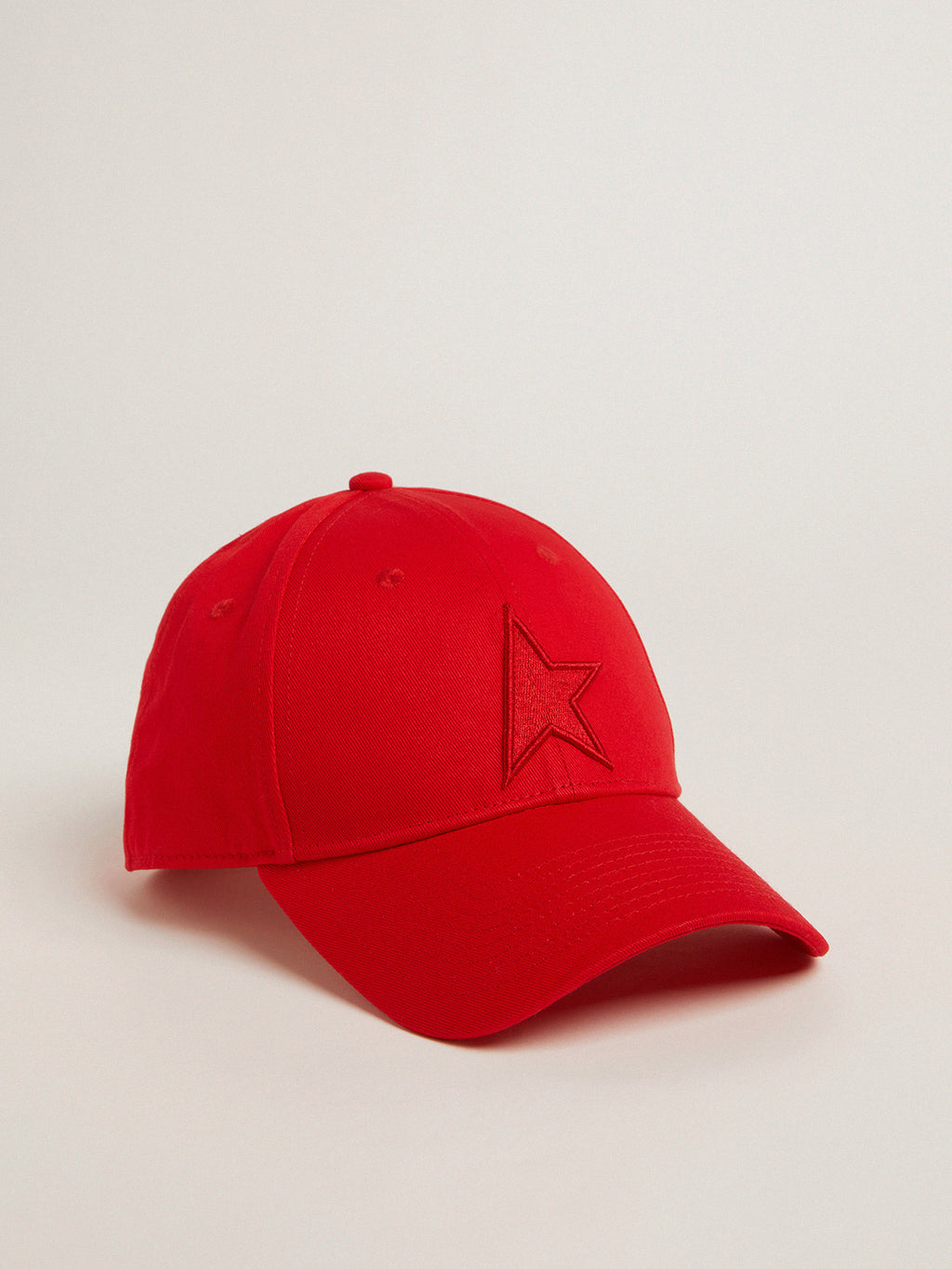 Red cotton baseball cap with tone-on-tone star-shaped patch on the front| Golden Goose