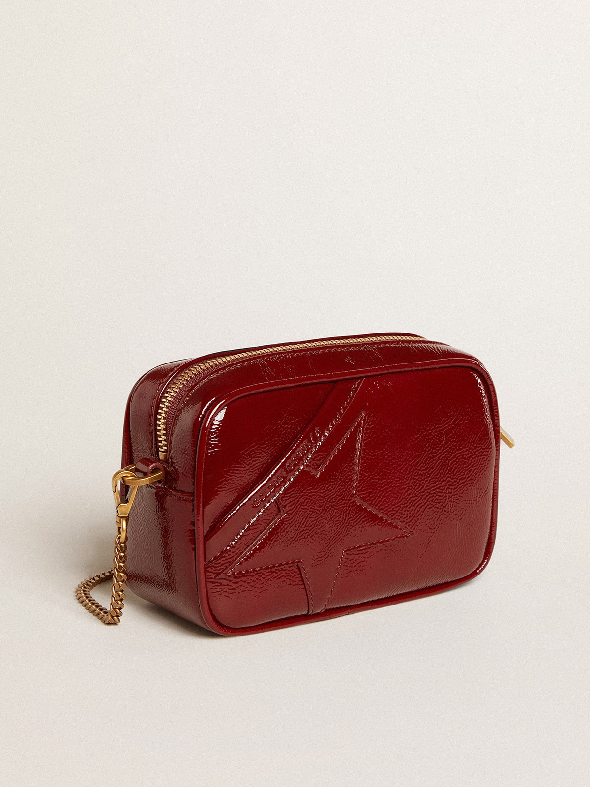 Mini Star Bag in burgundy patent leather with tone-on-tone star| Golden Goose