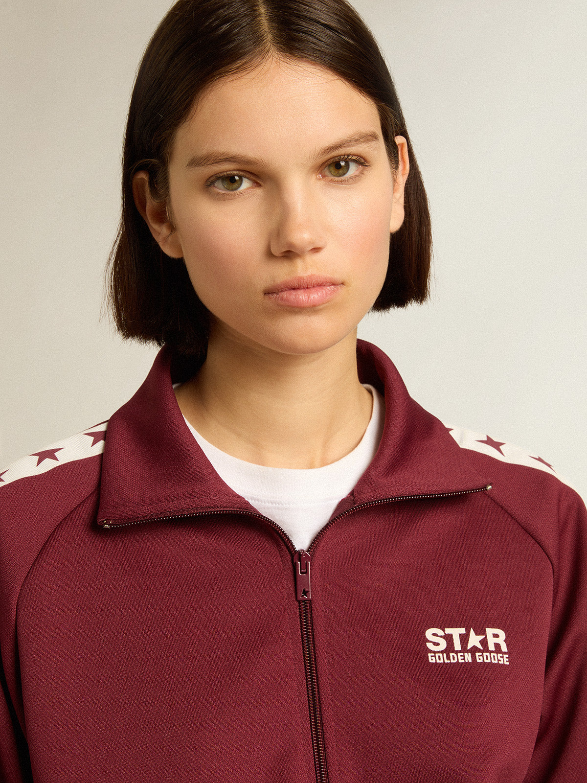 Women's burgundy zipped sweatshirt with white strip and contrasting stars| Golden Goose