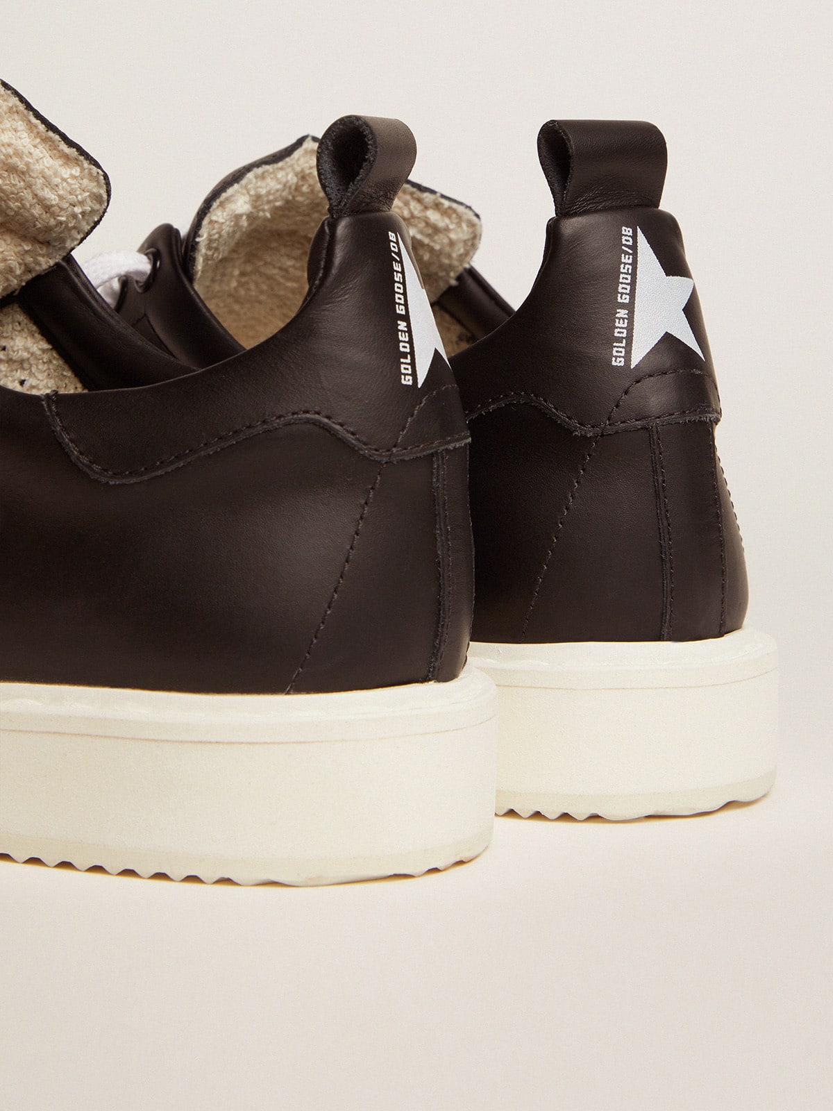 Starter sneakers in total black leather| Golden Goose