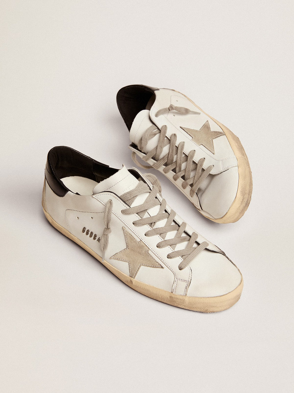 Men's Super-Star with black heel tab and metal stud lettering| Golden Goose
