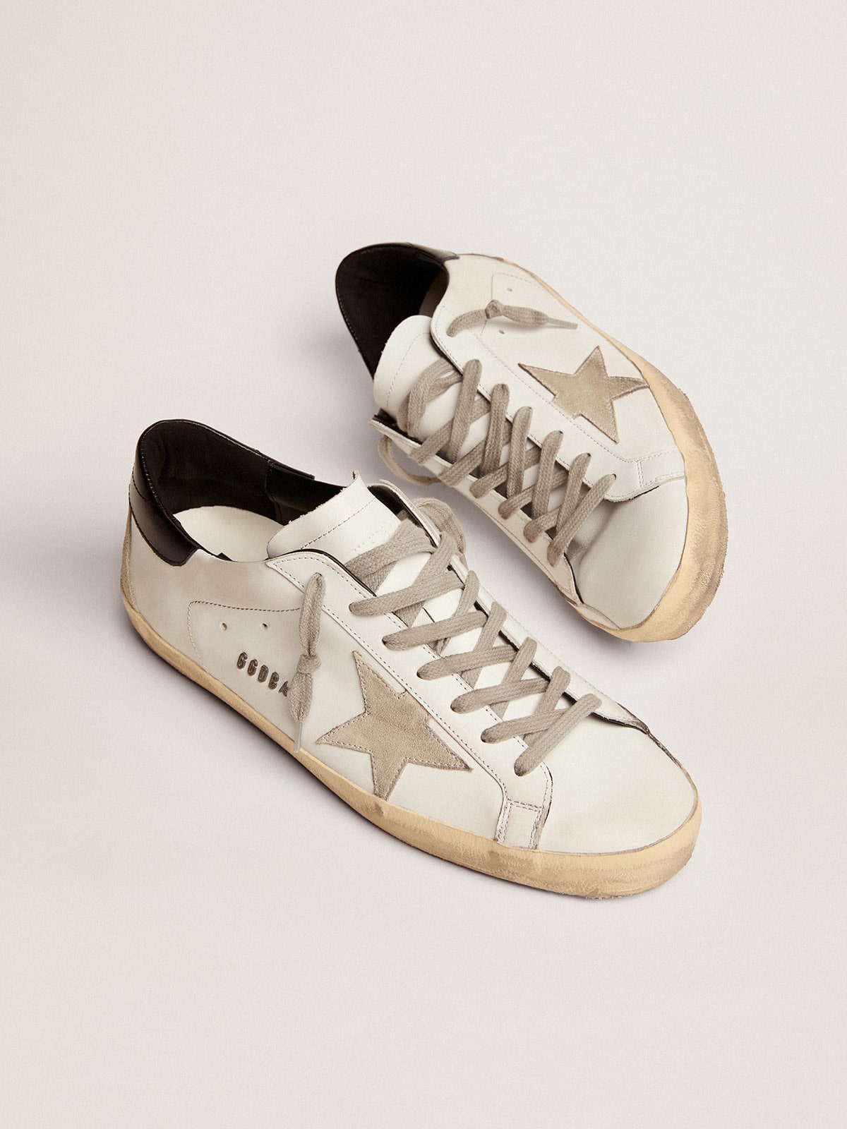 Men's Super-Star with black heel tab and metal stud lettering| Golden Goose