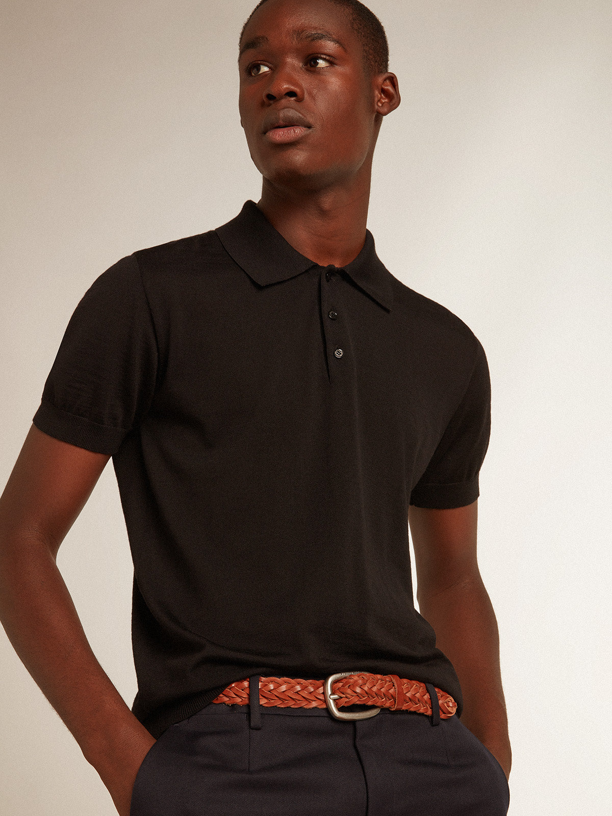 Men's short-sleeved polo shirt in black merino wool| Golden Goose
