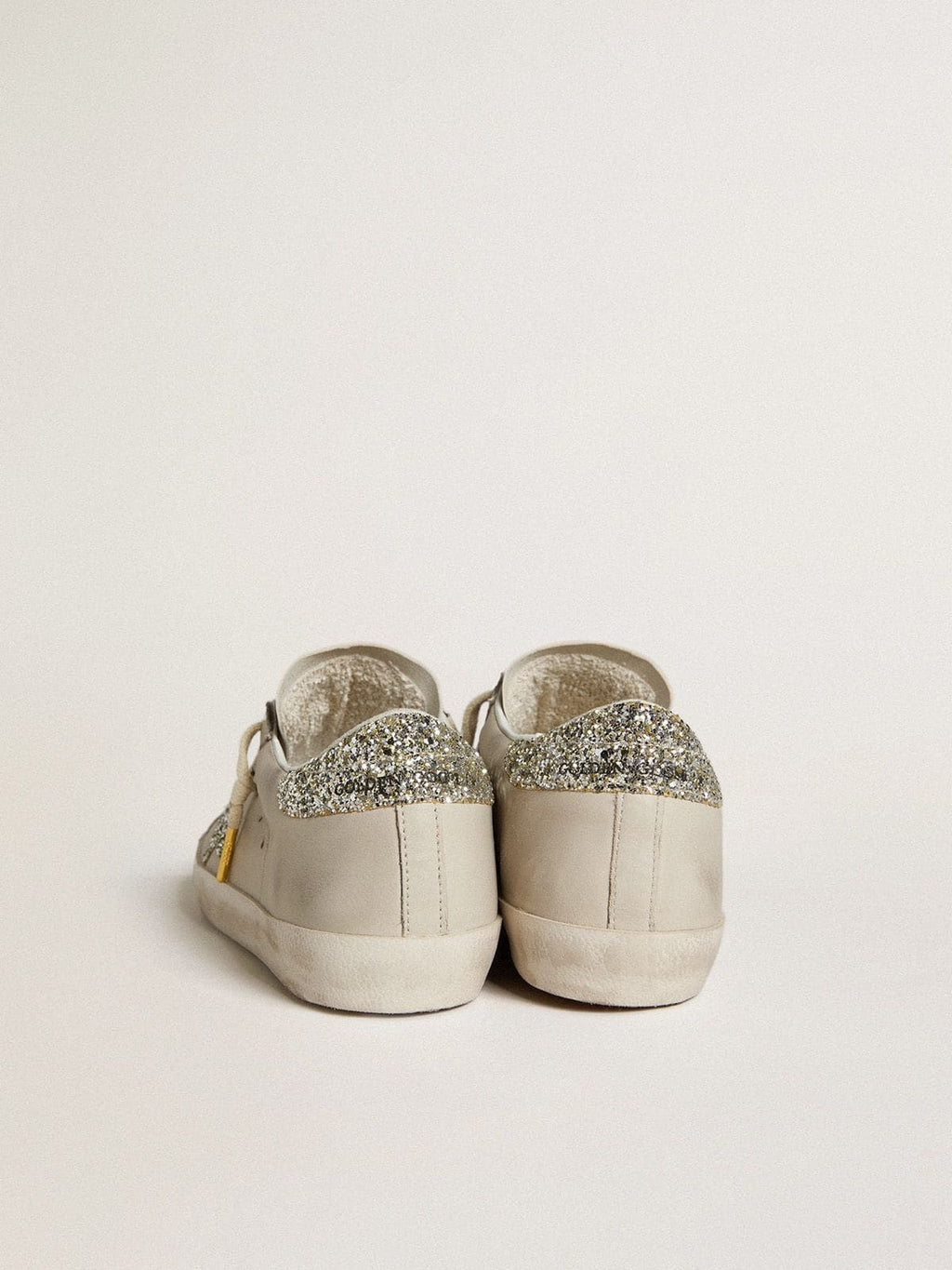 Women's Super-Star LTD in ivory nappa leather with platinum glitter star and heel tab| Golden Goose