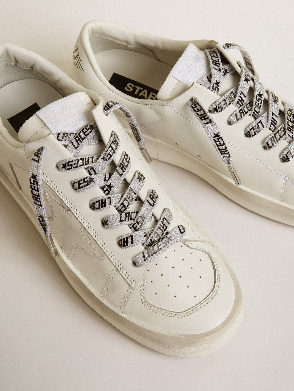 Ice-colored laces with contrasting black 'Laces' lettering| Golden Goose